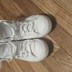 Chuck Taylor Converses barely worn there's a stain at the top of the shoe